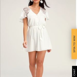 FIRST IMPRESSIONS WHITE CROCHET LACE SKATER DRESS